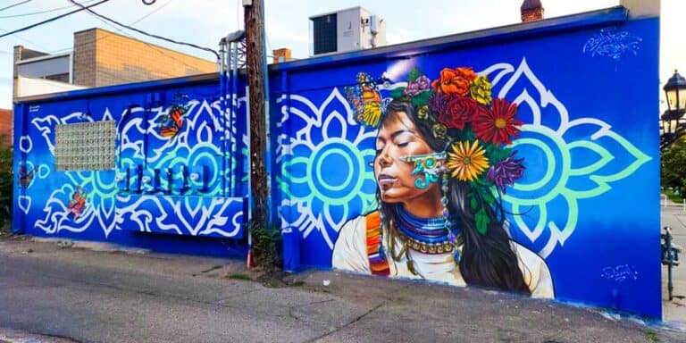 Butterfly Kiss mural by Bimmer Torres at the Santafe Art District in Denver Colorado